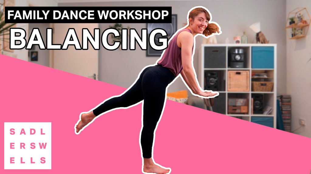 Cherie Coleman standing in a balance while leading a dance workshop