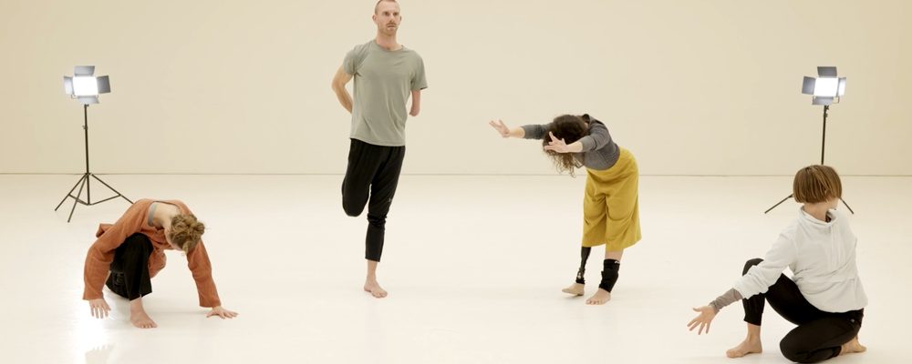 Four dancers from Candoco Dance Company